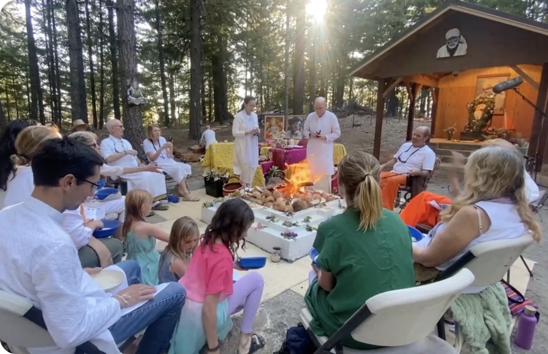Fire puja generating positive vibrations healing vibrations being performed in nature at the Divine Mother Center